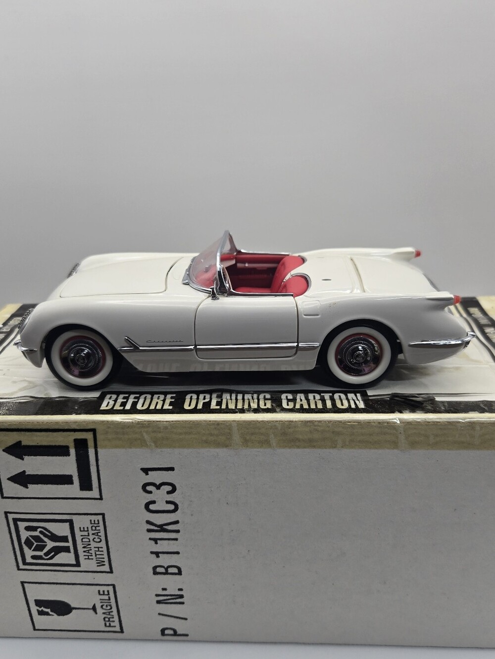 Franklin Mint 1:24 scale die-cast model of a 1953 Chevrolet Corvette.